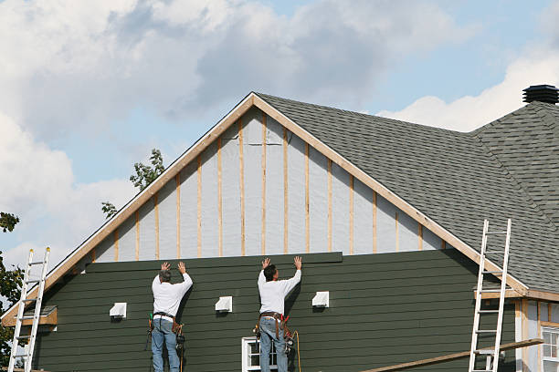 Professional Siding technician working in Ashley, OH